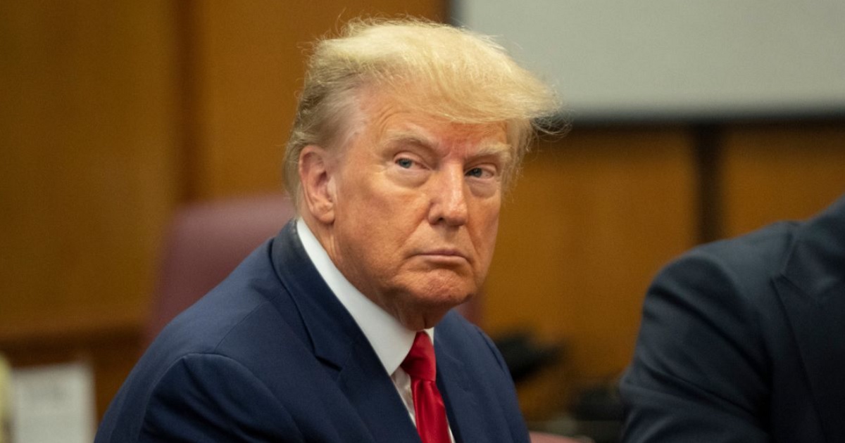 Former President Donald Trump appears in court at the Manhattan Criminal Court in New York City on Tuesday.