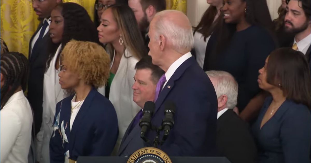 The White House cut a live broadcast of a speech on Friday after a woman standing behind President Joe Biden collapsed.