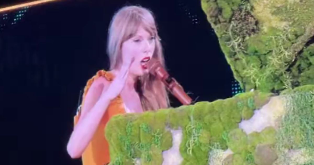 Singer Taylor Swift speaks during her Friday concert in Chicago.